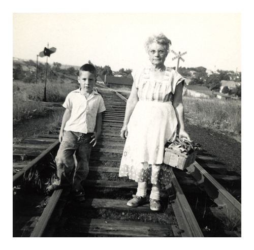 photograpbh of david and grandma standing on the railroad tracks